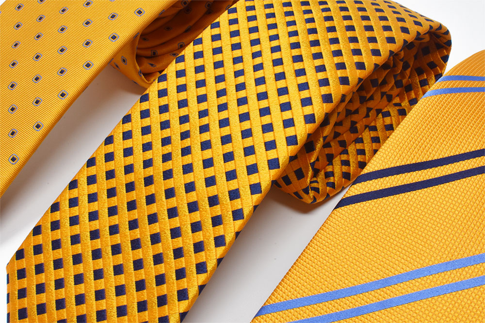 Andrews-Ties-cravatte-fondo-arancione-jacquard-orange-background-jacquard-ties-dettaglio-detail