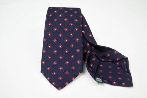 Cravatta Settepieghe - Jacquard – fondo blu con rosso – COD.7P026 – seta 100% - made in Italy
